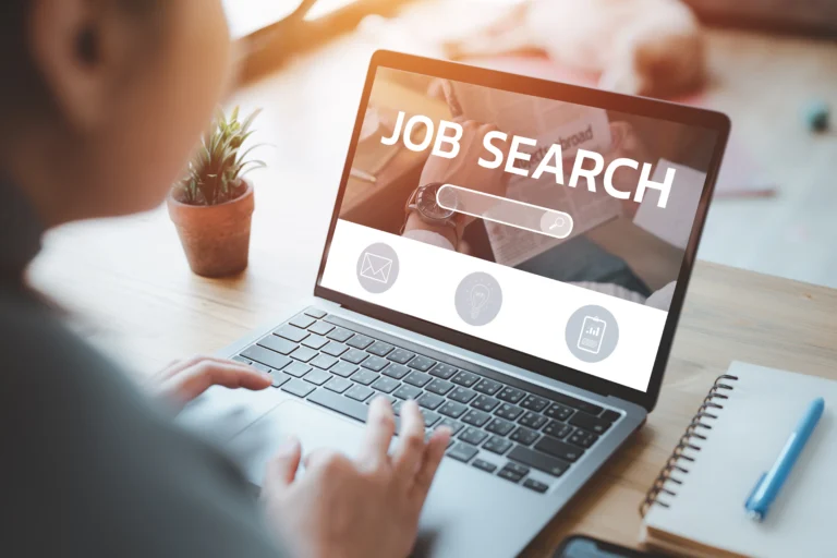 Technology professionals working together in open office — KORE1 IT staffing and contract workforce solutions for growing companies