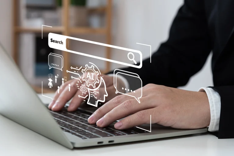 Skilled professional working at computer in modern office — KORE1 technology staffing solutions for IT and engineering employers