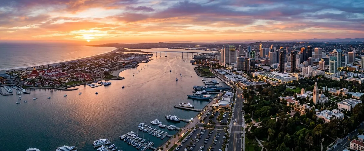 Aerial panoramic view of San Diego cityscape at sunset