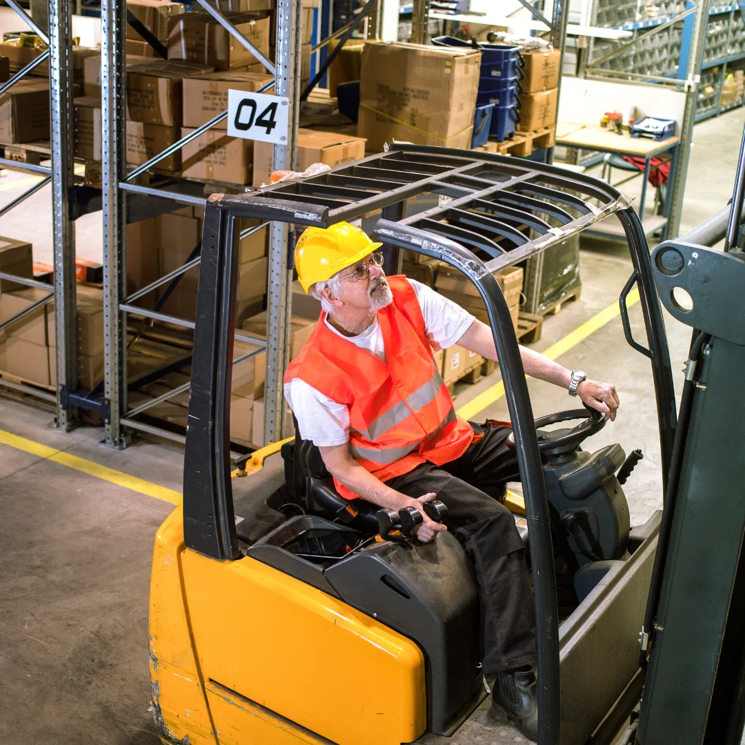 Warehouse workers and forklift operators