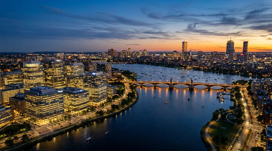 Aerial twilight view of Boston and Cambridge with the Charles River, Kendall Square, and downtown skyline