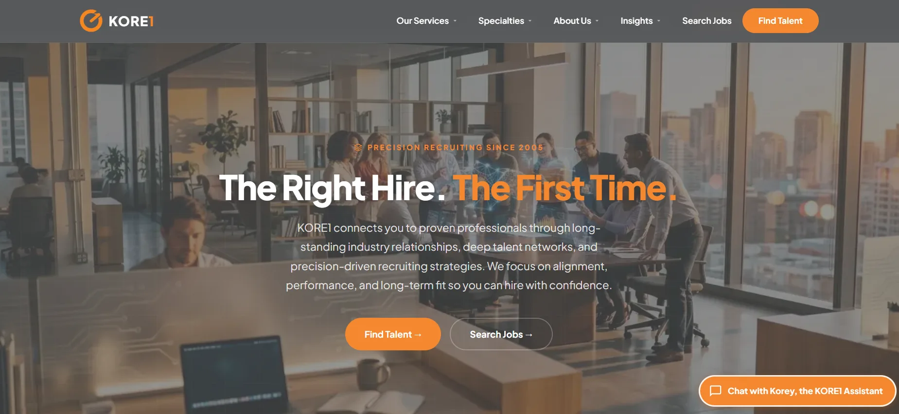 KORE1 IT staffing agency homepage showing The Right Hire The First Time tagline with modern office background